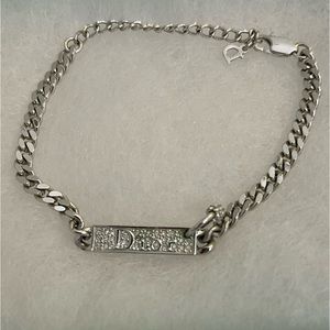 CHRISTIAN DIOR Pierced Logo Tag Bracelet
Early 2000’s